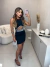 Conjunto de saia e cropped com aplicação de pedraria - preto - comprar online