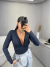 Body manga longa decote em v - preto na internet