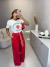Calça social com sobreposição na cintura - vermelho na internet
