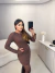 Image of Vestido curto com aplicações de pérola manga longa e decote nas costas - marrom