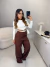 Body manga longa com aplicação frontal e recorte na cintura - off white - loja online