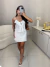 Conjunto de saia e blusa com babados e amarração frontal - off white na internet