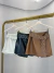 Image of Short saia com cinto boho couro pu - preto