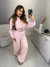 Macacão manga longa com cinto em couro - rosa - comprar online