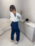 Calça cenoura alfaiataria com botões duplo - azul na internet