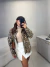 Imagem do Max jaqueta jeans animal print - onça