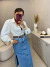 Saia jeans midi com fenda lateral - lavagem média - comprar online