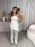 Blusa bata assimétrica com amarração no ombro - off white na internet