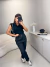 Calça alfaiataria reta com botões duplos encapados - preto - comprar online