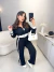Conjunto em moletinho de calça e casaquinho com listra lateral - preto - loja online