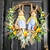 Guirlanda De Páscoa Com Casal De Coelho Amarelo 70x65cm - comprar online