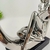 Enfeite Estatua Mulher Sentada Livro Prata Decoracao 25x23cm - Inigual - Loja de Decoração, Plantas Artificiais, Presentes, Utilidades, Mesa Posta e decoração de Páscoa e Natal