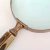 Lupa De Aumento Decorativa Marrom 24x10x2cm Oval Relevo - Inigual - Loja de Decoração, Plantas Artificiais, Presentes, Utilidades, Mesa Posta e decoração de Páscoa e Natal