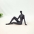 Escultura Homem Decorativo Sentado Preto 16x23x12cm