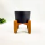 Vaso Decorativo Preto Com Suporte De Madeira 20x16cm na internet