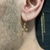 PAR DE BRINCOS CHICAGO - ARGOLA COM CRUZ - BANHADO A OURO 18k na internet