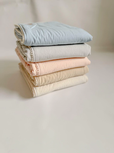 Manta Clara Valencia con pompon