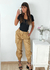 Pantalón cuerina tipo cargo con bolsillos laterales y cintura elastizada Duki - comprar online