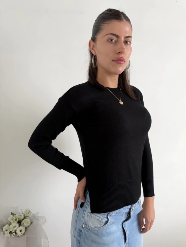Sweater bremer tajo en ruedo Targus