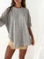 Remeron oversize con terminación redondeada Sakura - tienda online