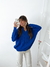 Sweater oversize escote en V y trenzas Silvie