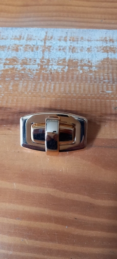 torniquete retangular dourado