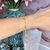 P3561 pulseira coração zirconias coloridas folheada a ouro 18k - comprar online