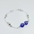 Pulsera con Bolitas y Ojitos Griegos Plata 925