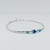 Pulsera Bolitas y Tubitos con Dije Ojito Griego plata 925