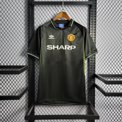 manchester-united-umbro-retro-1998-away-reserva-2-fora-preto-preta-liga-dos-campeoes-champions-league-patrocinios-patrocinadores-patches-patch-torcedor-torcedores-futebol-masculino-masculina-frete-gratis-envio-campeonato-internacional-europa-europeu-europ