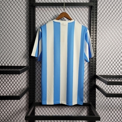 argentina-le-coq-sportif-retro-1986-home-titular-1-casa-azul-branco-branca-copa-do-mundo-patrocinios-patrocinadores-patches-patch-torcedor-torcedores-futebol-masculino-masculina-frete-gratis-envio-campeonato-internacional-selecao-selecoes-tecnologia-elast