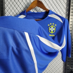 brasil-nike-retro-2002-away-reserva-2-fora-azul-branco-copa-do-mundo-patrocinios-patrocinadores-patches-patch-torcedor-torcedores-futebol-masculino-masculina-frete-gratis-envio-campeonato-internacional-selecao-selecoes-tecnologia-elastano-poliester-