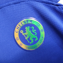 chelsea-nike-23-24-2023-2024-home-1-casa-titular-i-branco-branca-azul-oficial-original-licenciada-camisa-camiseta-nova-lancamento-temporada-novo-profissional-torcedora-mulher-torcedores-futebol-feminina-feminino-justa-curta-uniforme-frete-gratis-tecnologi