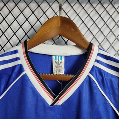 manchester-united-adidas-retro-1988-away-reserva-2-fora-branco-branca-azul-liga-dos-campeoes-champions-league-patrocinios-patrocinadores-patches-patch-torcedor-torcedores-futebol-masculino-masculina-frete-gratis-envio-campeonato-internacional-europa-europ