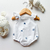 Body volados blanco flores