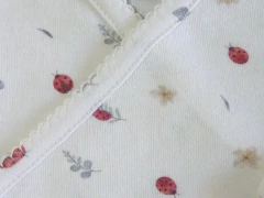 Ajuar básico estampado vaquitas crudo en internet