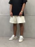 Shorts de Moletom Cursive Logo - Off White na internet