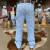 Calça masculina All Western Carpinteira Delave vista de trás, com detalhes em costura e bolsos.