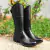 Bota infantil unissex de hipismo montaria na cor preta, destacando seu design elegante e material de alta qualidade.