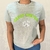 Camiseta feminina mescla grafite da marca Gross Hunter com estampa em verde e detalhes em branco.