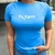 Camiseta feminina azul com logo tx.farm, modelo UV50+, vista frontal.