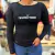Camiseta UV50+ térmica feminina na cor preta com estampa da marca Texas Farm.