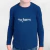 Camiseta infantil de manga longa na cor azul marinho com a logo tx.farm estampada na frente.