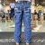 Calça masculina Docks Carpinteira Xtreme vista traseira, com detalhes em costura e bolsos laterais.