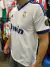 Camiseta del Real Madrid 2013/2014 de Cristiano Ronaldo, color blanco con detalles azules y el logo de Bwin.