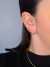 Brinco argolinha (G) cravejada com zircônias (grande), banhado a ouro 18K.