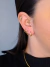 Imagem do Brinco argolinha (G) cravejada com zircônias (grande), banhado a ouro 18K.