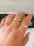 Imagem do Anel solitário com detalhes em zircônias, banhado a ouro 18K.