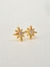 Brinco de estrela com uma zircônia, banhado a ouro 18K. - comprar online