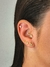 Piercing de olho grego com uma zircônias, banhado a ouro 18K.
